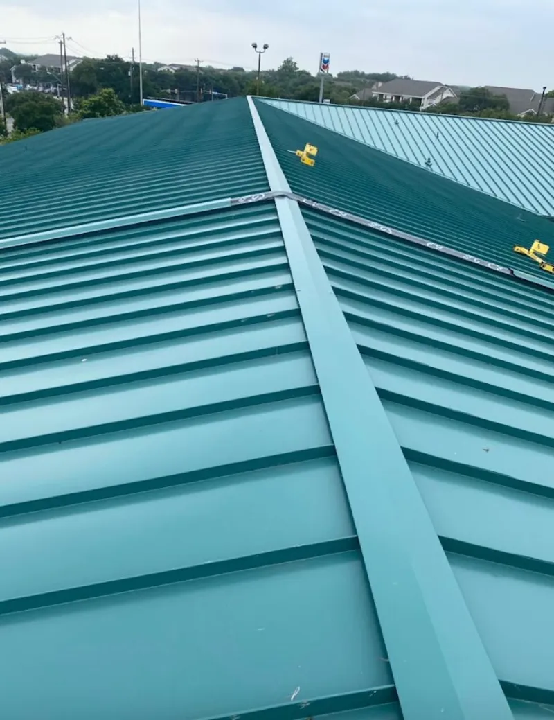 Green commercial metal roof ridge and valley for Metal Roof Repair in Loyalsock